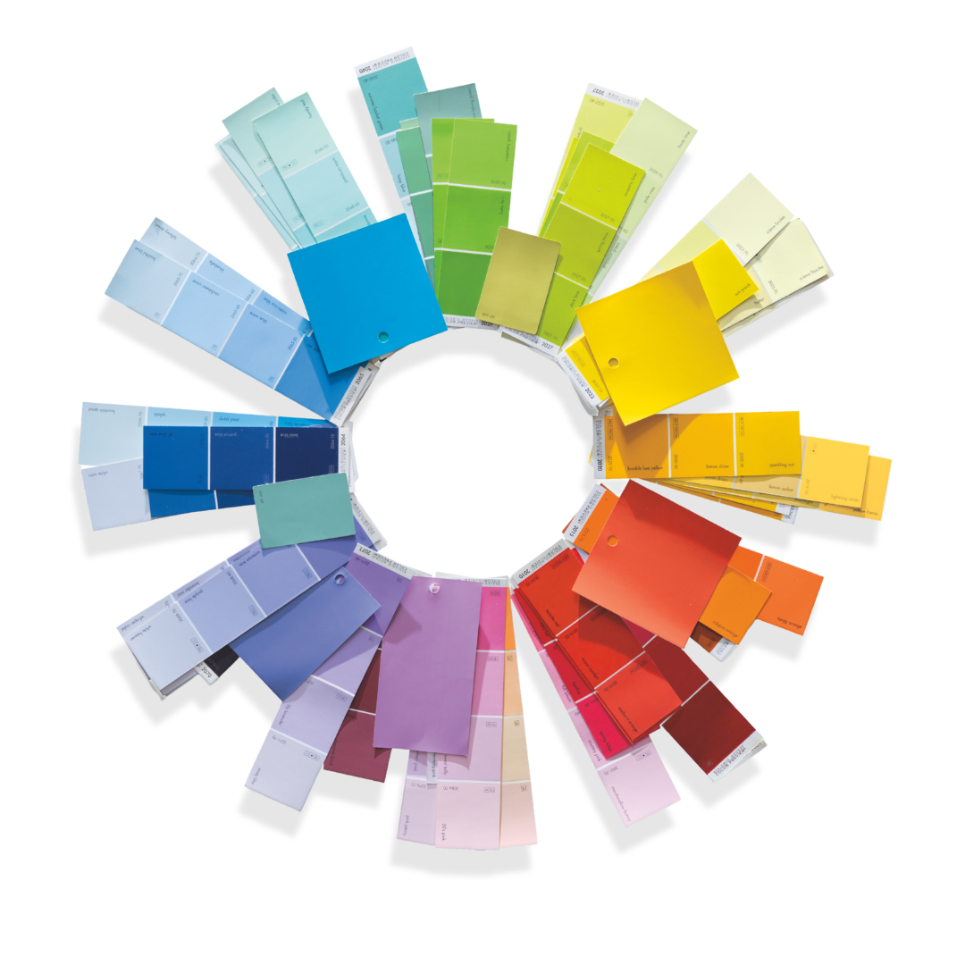 Fanned out Benjamin Moore color swatches showing a vibrant palette of paint colors