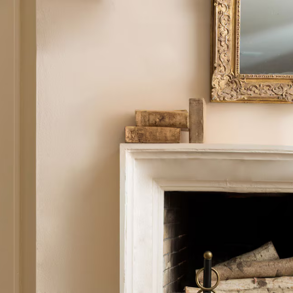 A fireplace along the wall painted in Benjamin Moore Affinity Color Collection paint