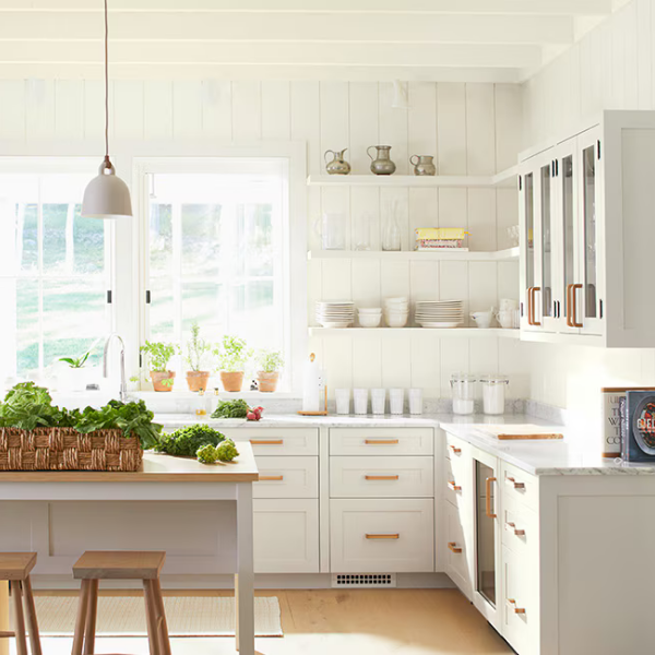 A brightly lit kitchen area painted using the Benjamin Moore Off White Color Collection